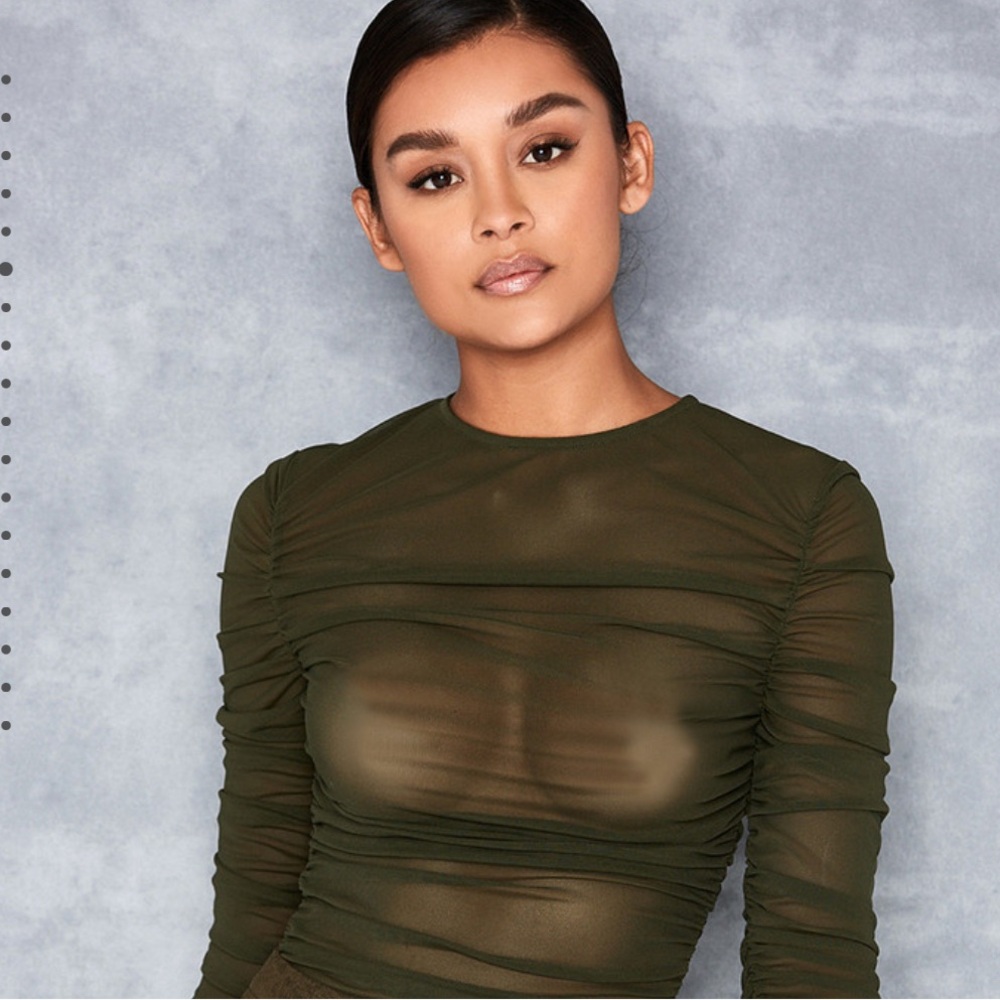 Mistress rocks sheer green bodysuit